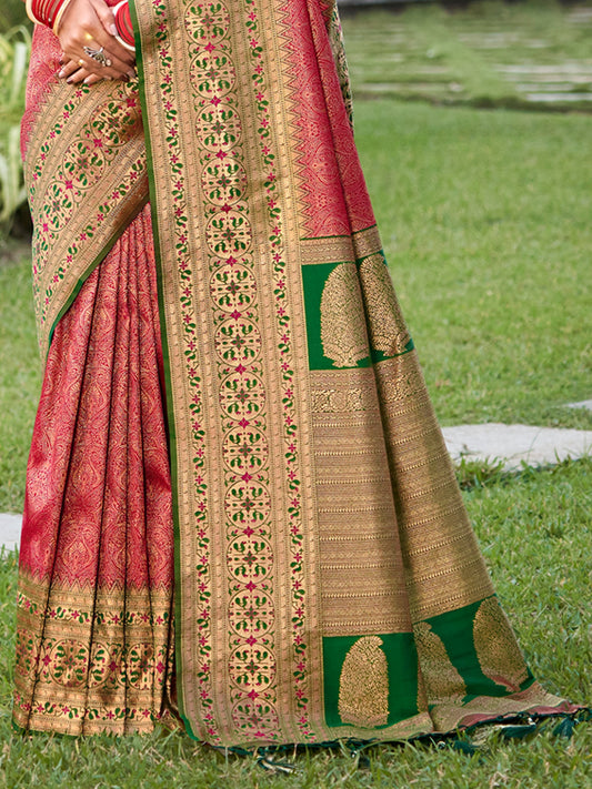 Rani pink zari woven saree for women with green contrast border and heavy pallu