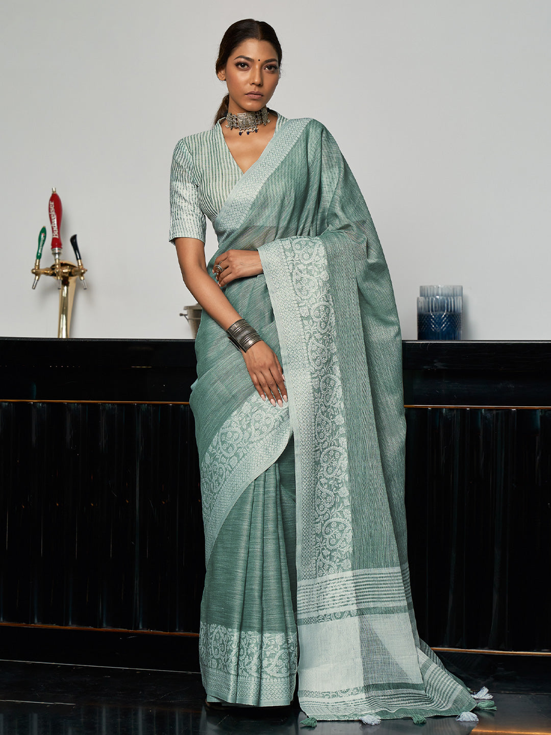 Sutriti Women Teal Green & Silver-Toned Woven Design Linen Blend Saree