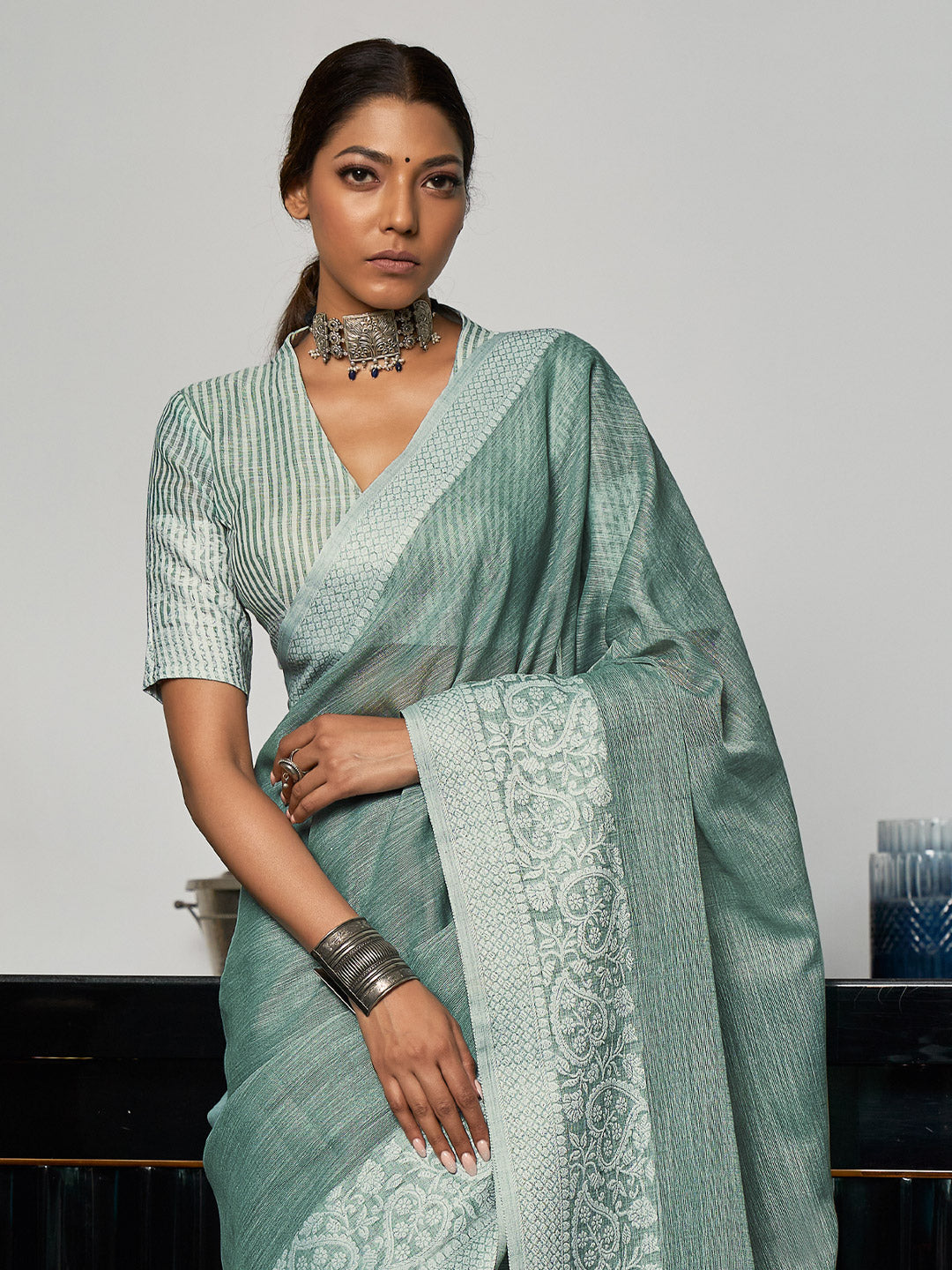 Sutriti Women Teal Green & Silver-Toned Woven Design Linen Blend Saree