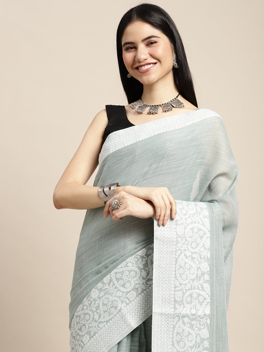 Sutriti Women Teal Green & Silver-Toned Woven Design Linen Blend Saree