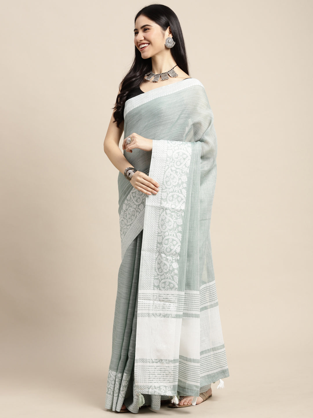 Sutriti Women Teal Green & Silver-Toned Woven Design Linen Blend Saree