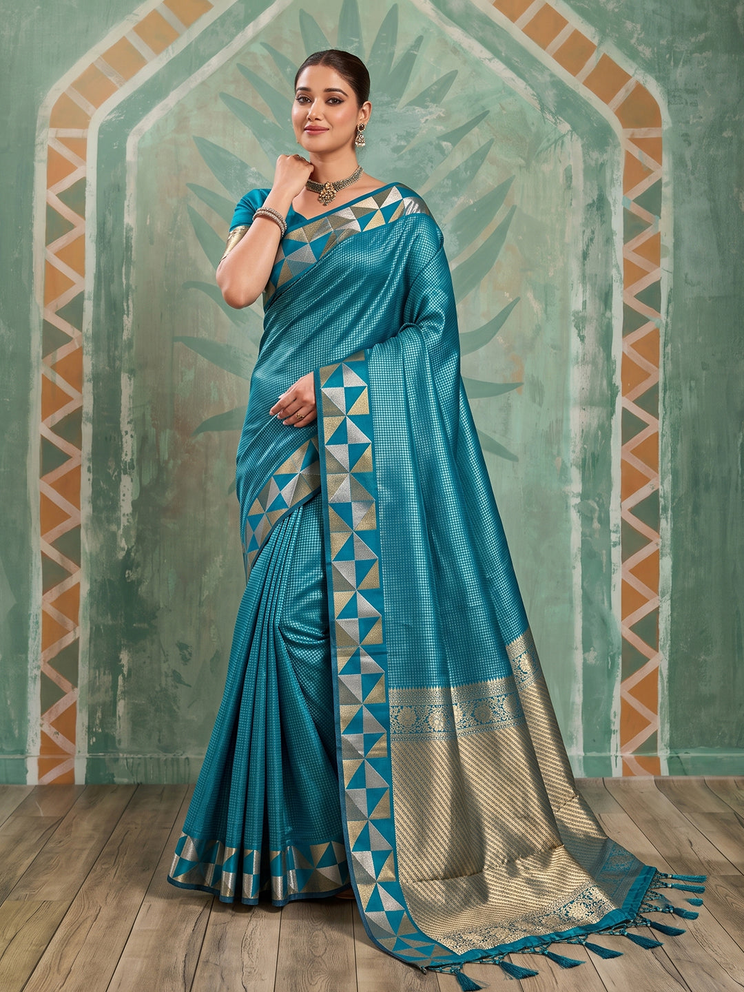 Sutriti Teal Blue Art Silk Saree With Geometric Gold Border | Women's Party Wear