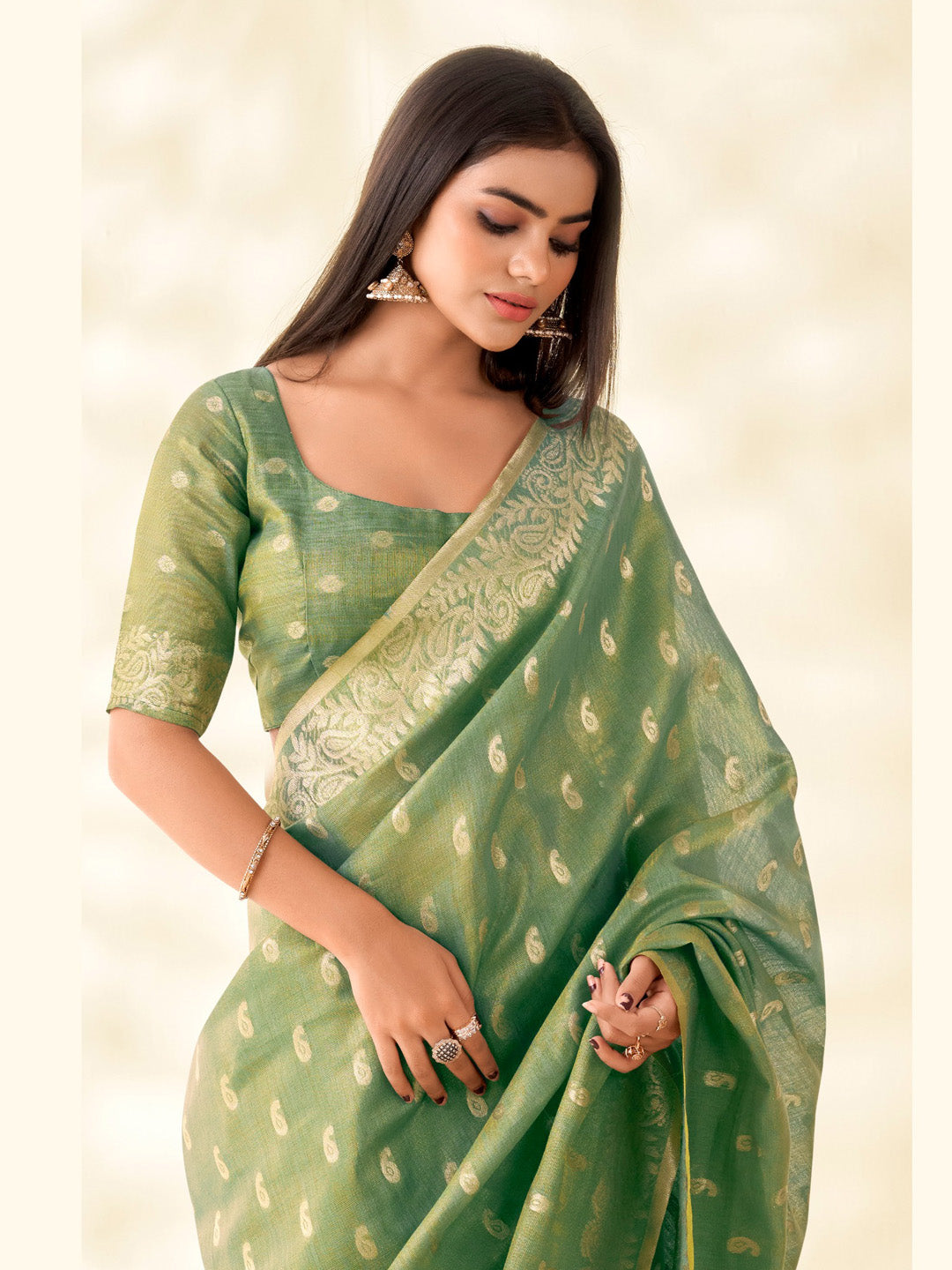 Sutriti Women Green Woven Banarasi Tissue Silk Saree