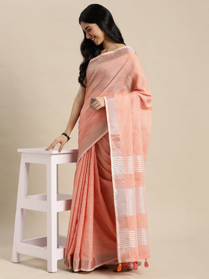 Sutriti Elegant Peach Woven Linen Saree with Contrast Zari Border & Tassels – Soft & Breathable Party Wear