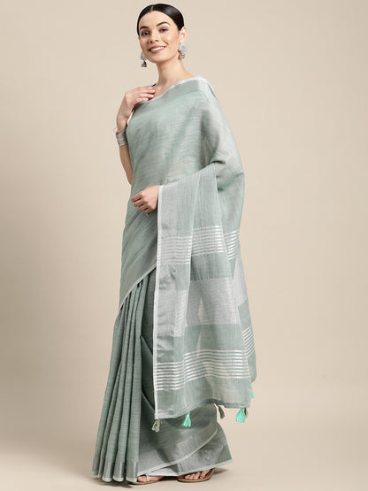 Sutriti Elegant Sea Green Woven Linen Saree with Contrast Zari Border & Tassels – Soft & Breathable Party Wear