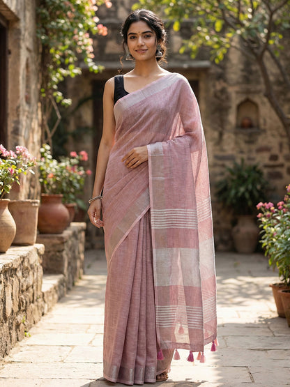 Sutriti Elegant Mauve Woven Linen Saree with Contrast Zari Border & Tassels – Soft & Breathable Party Wear