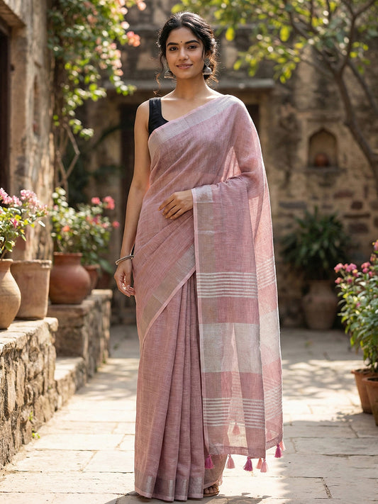 Sutriti Elegant Mauve Woven Linen Saree with Contrast Zari Border & Tassels – Soft & Breathable Party Wear