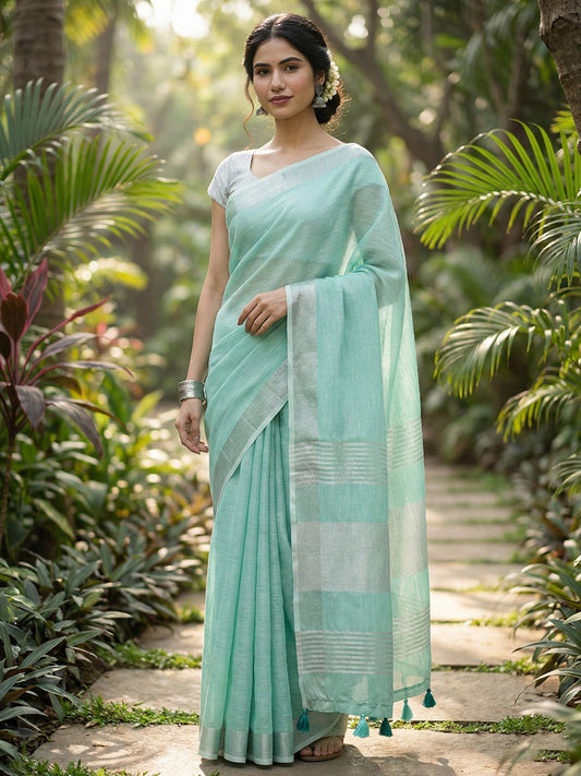 Sutriti Elegant Turquoise Woven Linen Saree with Contrast Zari Border & Tassels – Soft & Breathable Party Wear