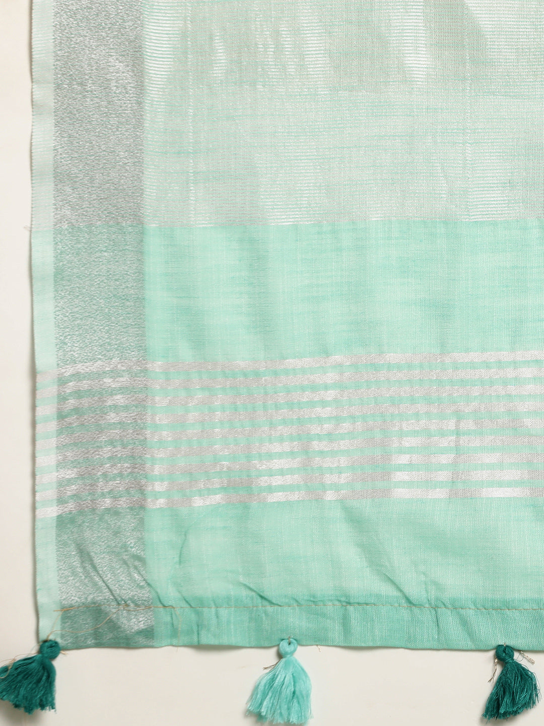 Sutriti Elegant Turquoise Woven Linen Saree with Contrast Zari Border & Tassels – Soft & Breathable Party Wear