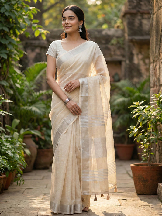 Sutriti Elegant Beige Woven Linen Saree with Contrast Zari Border & Tassels – Soft & Breathable Party Wear