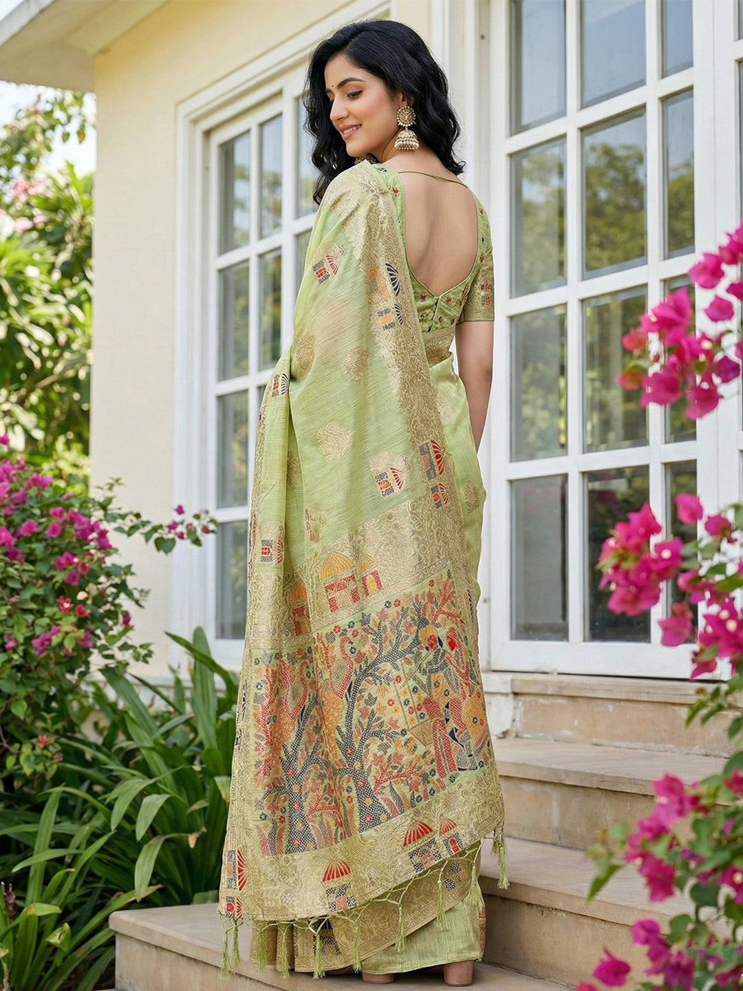 Sutriti Pista Green Woven Linen Saree with Artistic Pallu & Tassels | Elegant Traditional Wear