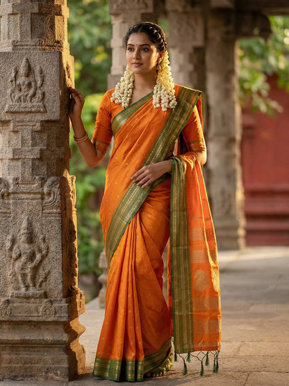 Orange woven zari border silk blend saree for women with butti design and blouse piece