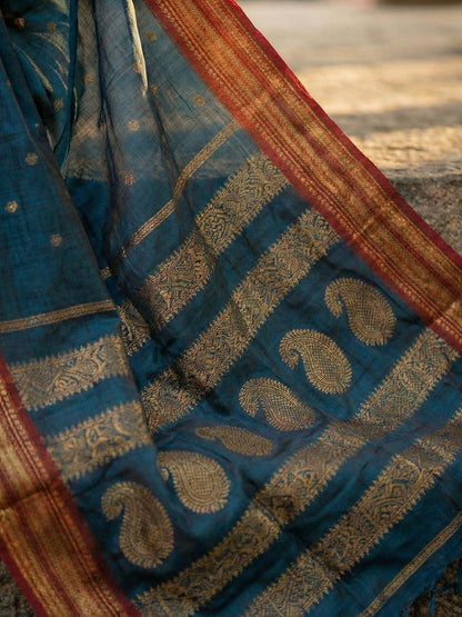 Teal blue woven zari border silk blend saree for women with butti design and blouse piece