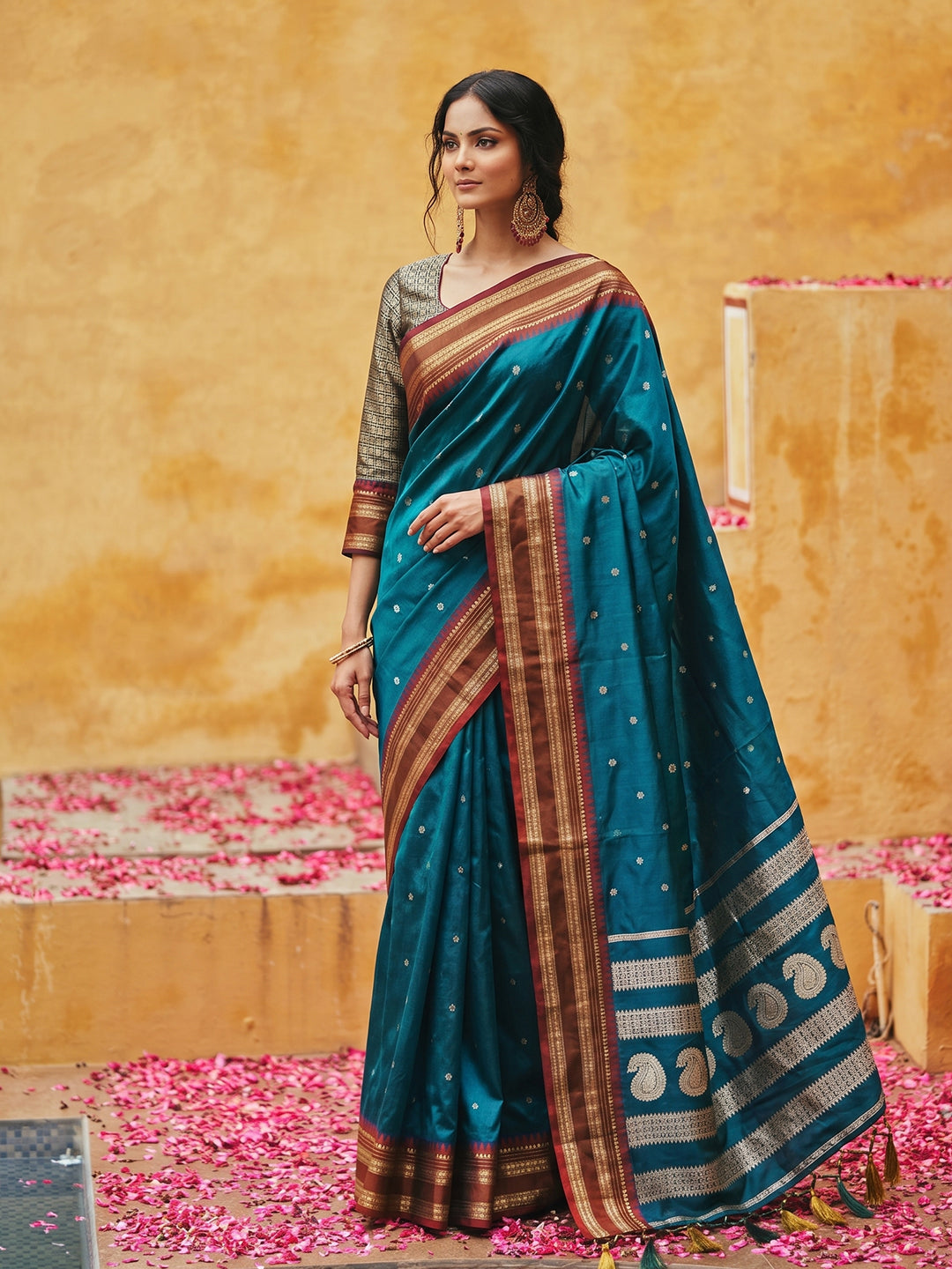 Sutriti The Peacock Hue: Teal Blue Soft Silk Saree with Contrast Red Zari Border
