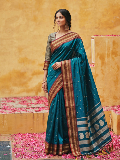 Sutriti The Peacock Hue: Teal Blue Soft Silk Saree with Contrast Red Zari Border