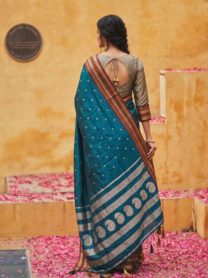 Sutriti The Peacock Hue: Teal Blue Soft Silk Saree with Contrast Red Zari Border