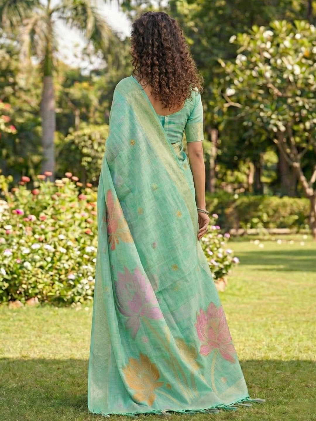 Sutriti Women Sea Green & Pink Floral Printed Linen Silk Blend Saree