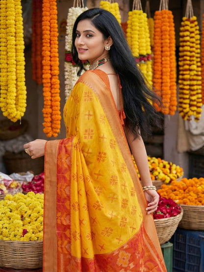 Mustard yellow woven saree with orange contrast border and printed pallu for festive wear