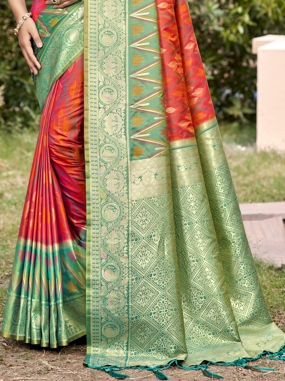 Orange woven saree for women with green gold border and heavy jacquard pallu