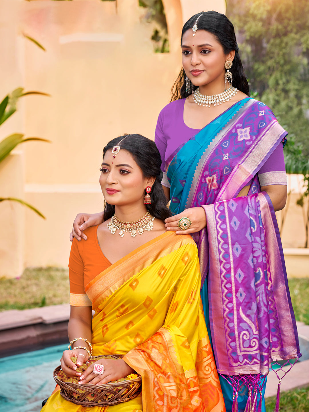 Teal blue woven saree for women with purple contrast border and tassel pallu