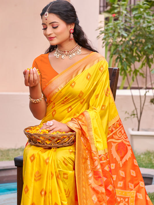 Yellow woven saree for women with orange contrast border and designer pallu for haldi festive wear