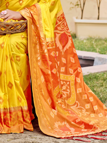 Yellow woven saree for women with orange contrast border and designer pallu for haldi festive wear