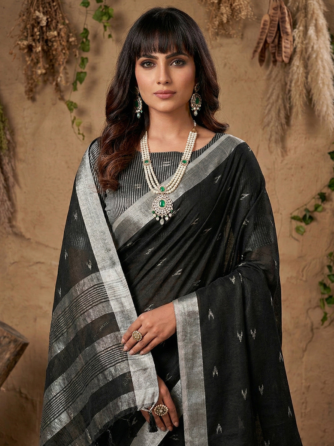 Sutriti Women Black Woven Design Linen Saree with Silver Zari