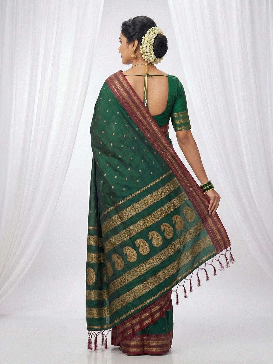Sutriti The Emerald Empress: Dark Green Soft Silk Saree with Rich Crimson Red Zari Border