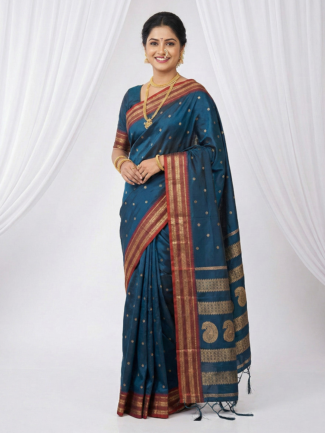 Sutriti The Peacock Hue: Teal Blue Soft Silk Saree with Contrast Red Zari Border