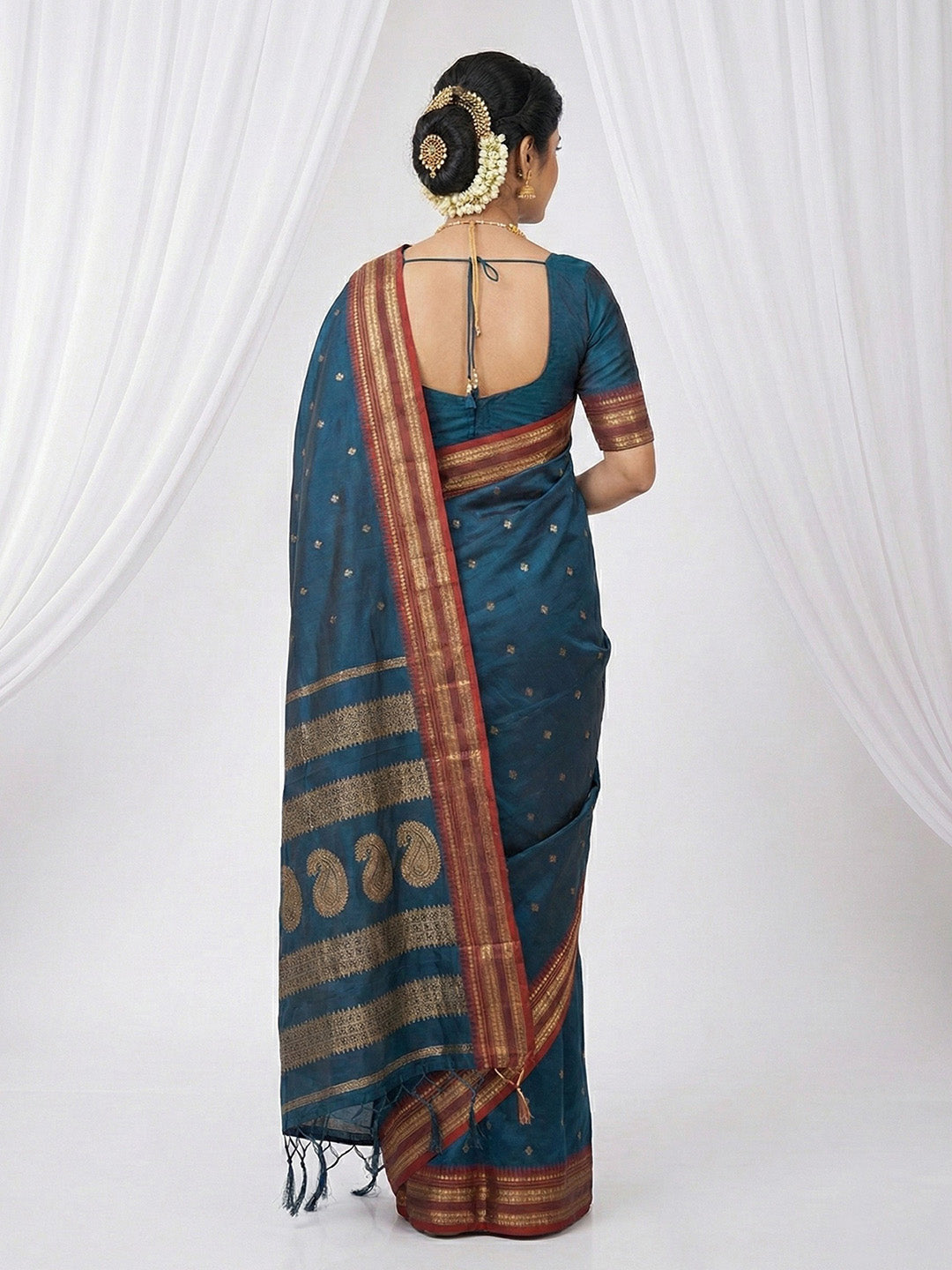 Sutriti The Peacock Hue: Teal Blue Soft Silk Saree with Contrast Red Zari Border