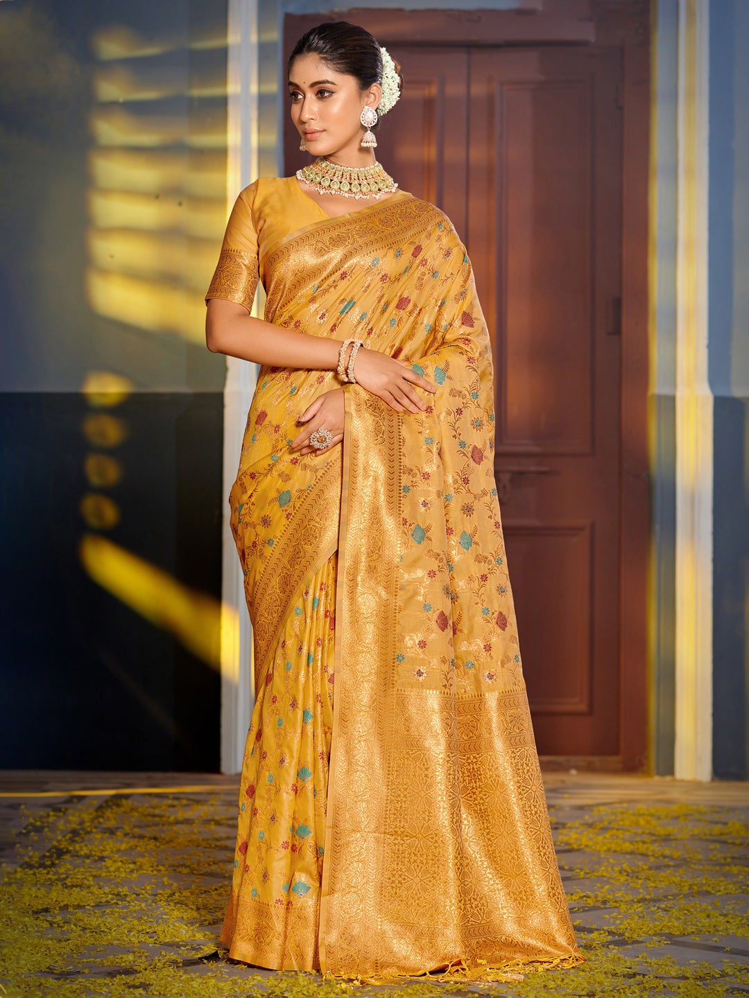 Mustard gold woven floral zari silk blend saree for women with rich zari border and blouse piece