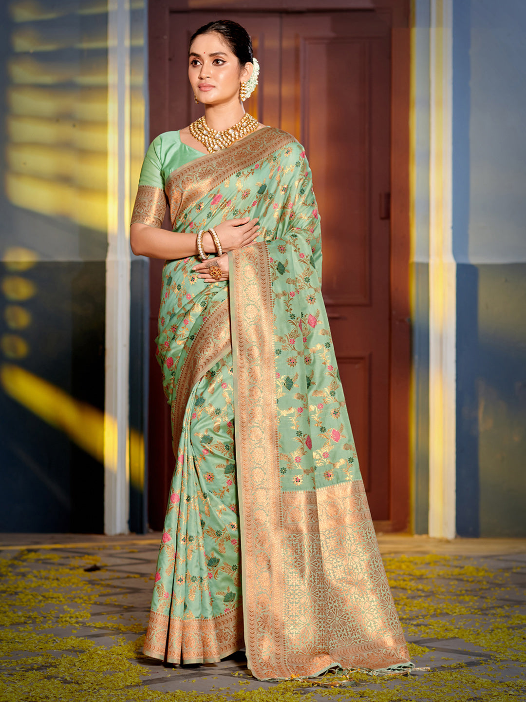 Mint green woven floral zari silk blend saree for women with rich zari border and blouse piece