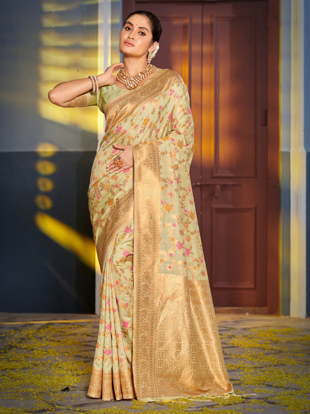 Pastel pista green woven floral zari silk blend saree for women with rich zari border and blouse piece