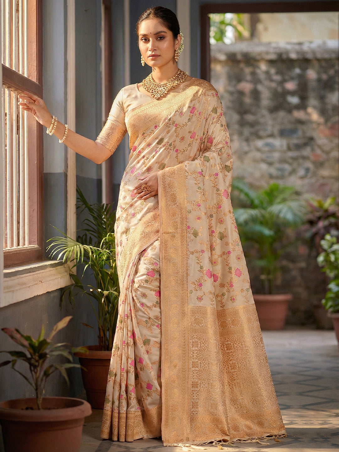 Sutriti Graceful White Banarasi Silk Saree with Golden Zari Woven Border & Floral Jaal – Wedding & Festive Wear