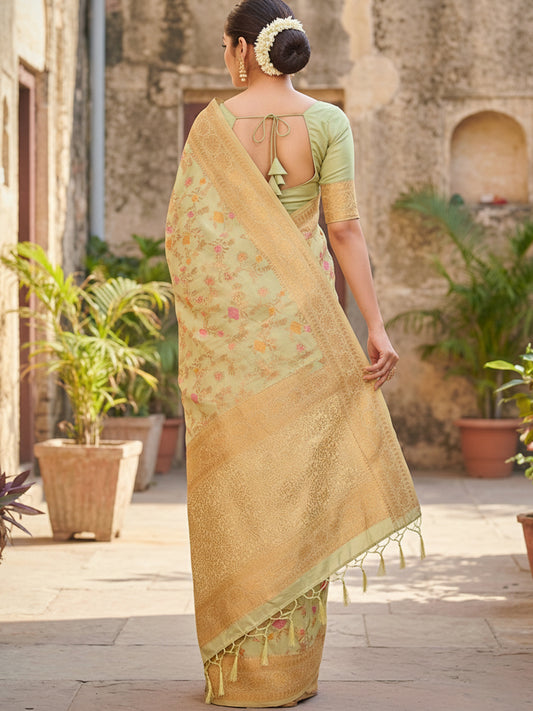 Sutriti Graceful Light Green Banarasi Silk Saree with Golden Zari Woven Border & Floral Jaal – Wedding & Festive Wear