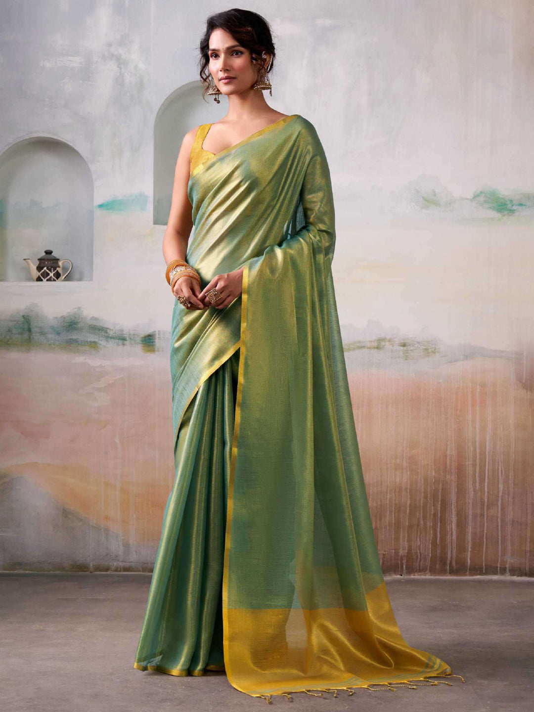 Sutriti Women Teal Green & Gold-Toned Solid Tissue Silk Saree with Zari Border