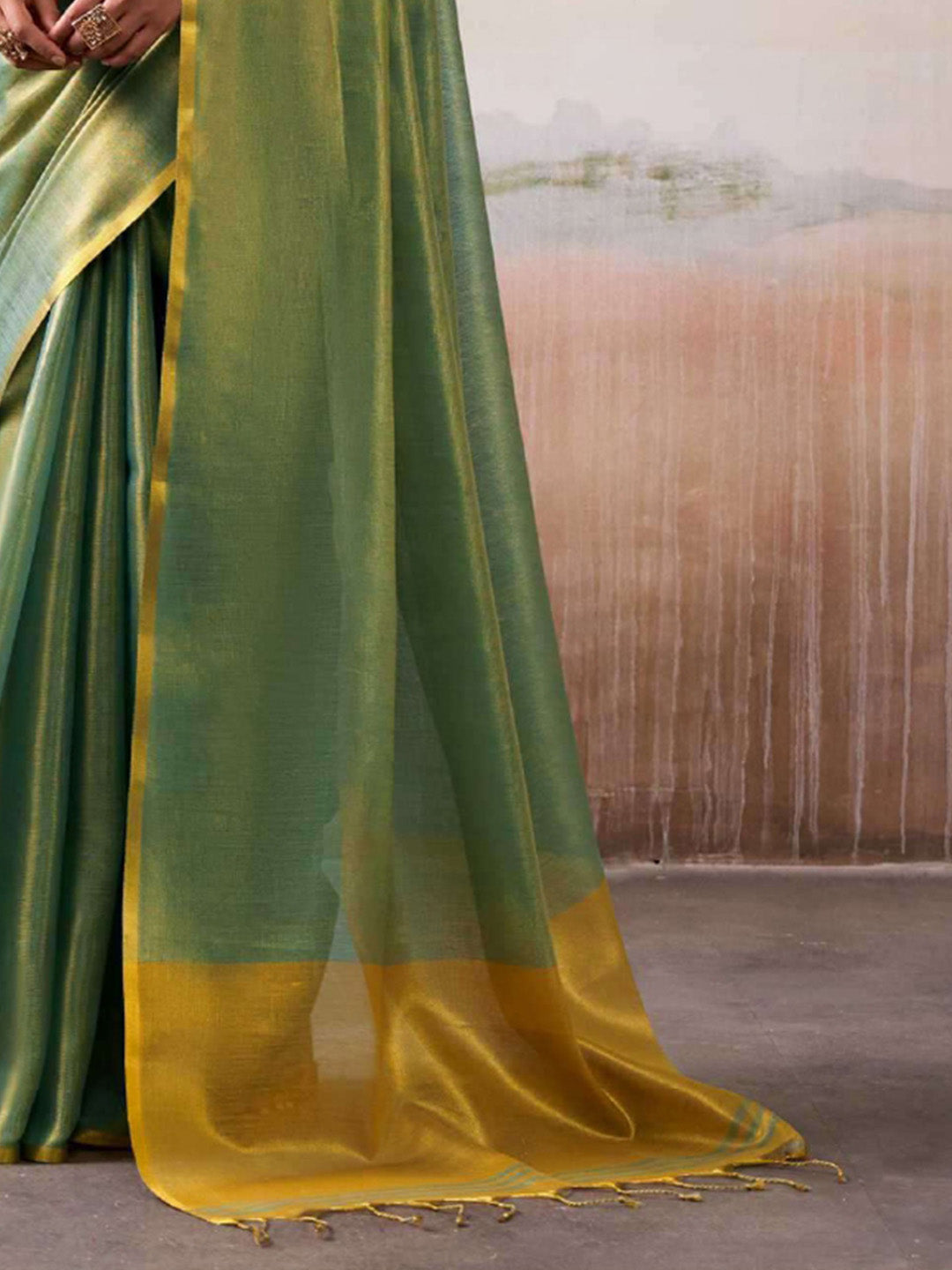 Sutriti Women Teal Green & Gold-Toned Solid Tissue Silk Saree with Zari Border