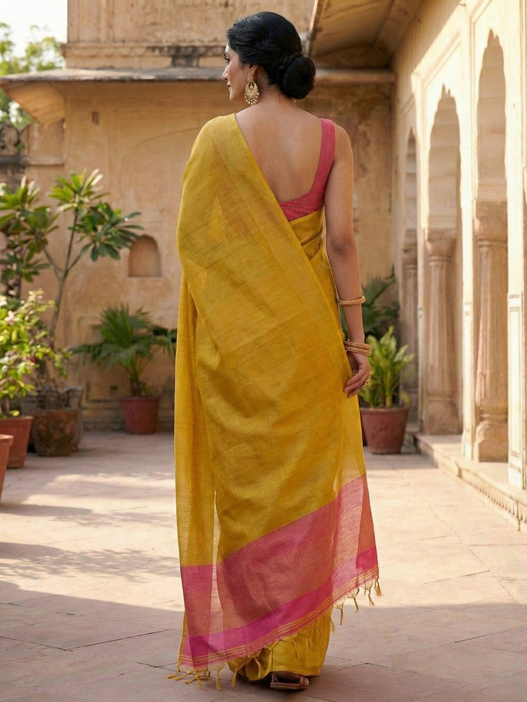 Sutriti Women Bright Yellow & Pink Solid Tissue Silk Saree with Zari Border
