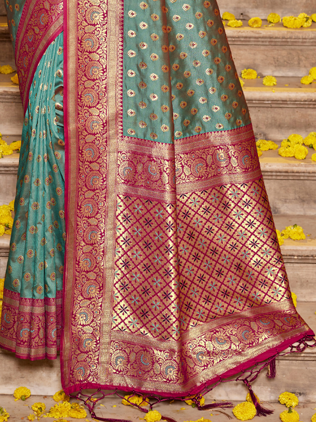 Teal green zari woven saree for women with magenta contrast border and rich pallu for wedding festive wear