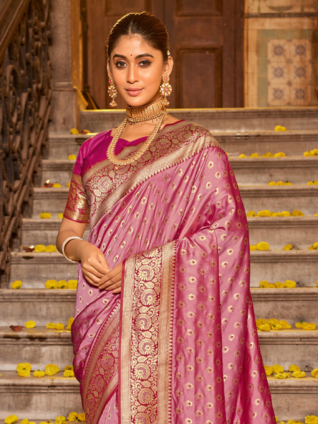 Rani pink zari woven saree for women with rich zari border and heavy pallu for wedding wear